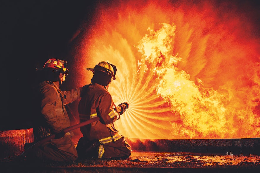 Fearless firefighters battling blaze with water an medium